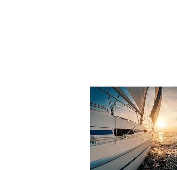Luxury Yatch sailing at sunset